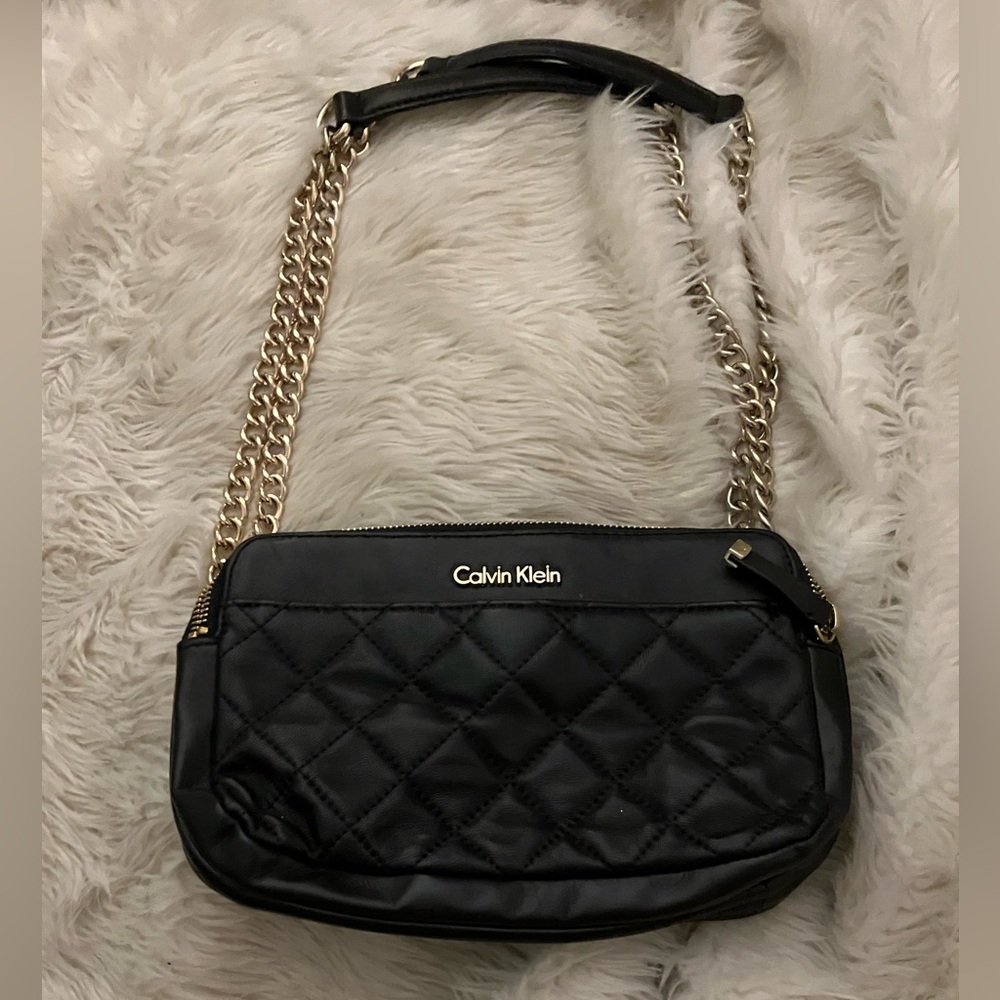Calvin Klein quilted purse with gold chain straps. Lovely for going out!